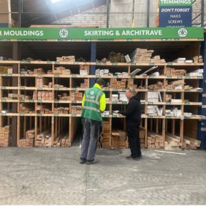 Sarah-buying-locally-wood-supplies-for-the-courses